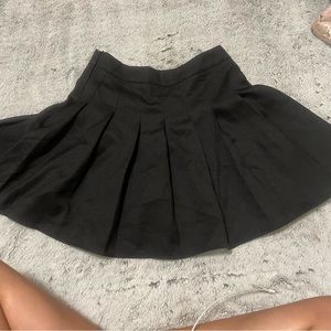 black pleated skirt